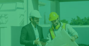 Two men looking at construction plans